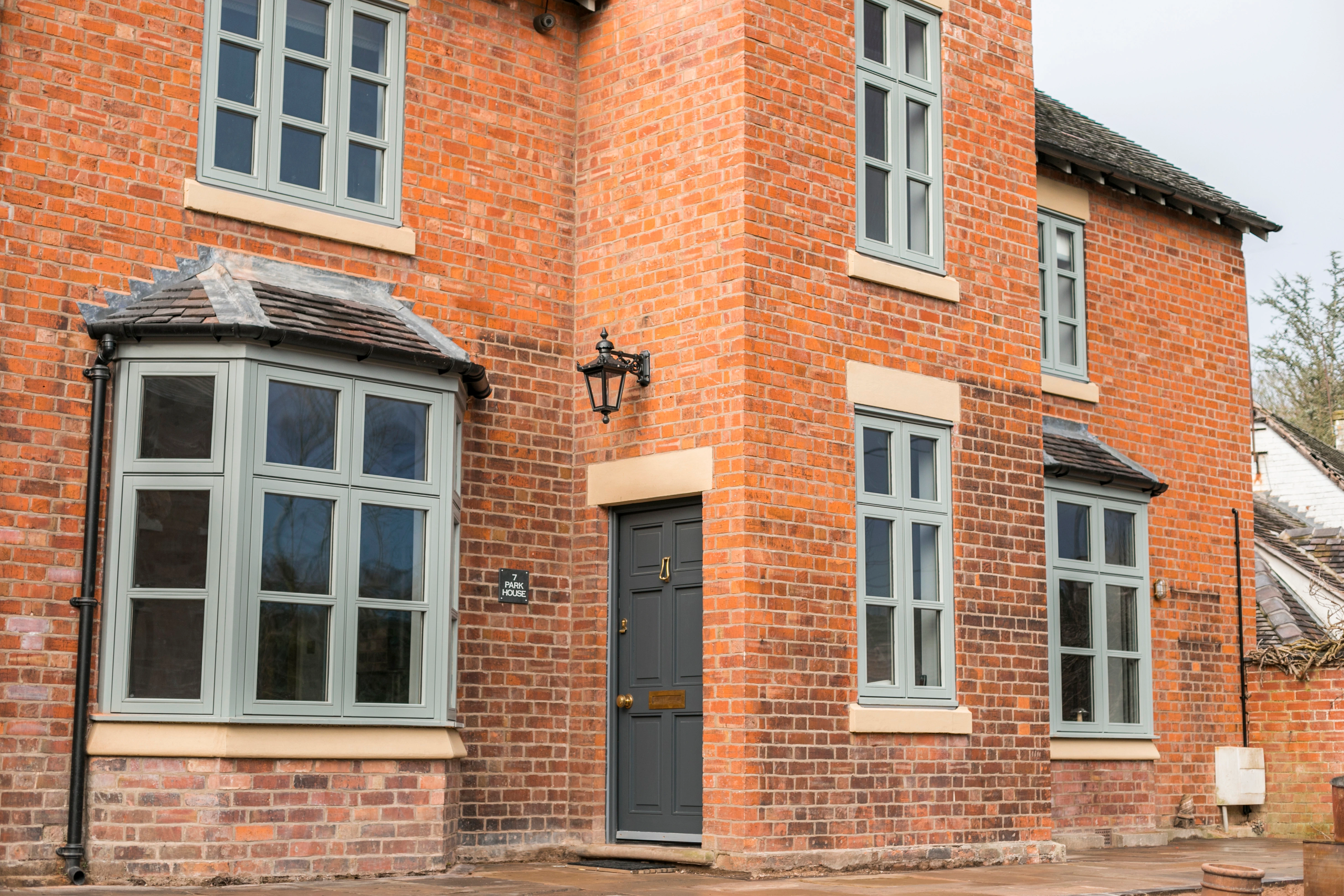 Flush Casement windows in pale green